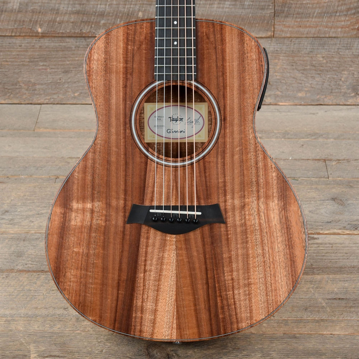 Taylor GS Mini-e Koa LEFTY Natural w/ES-B & Gig Bag - MusicMarket